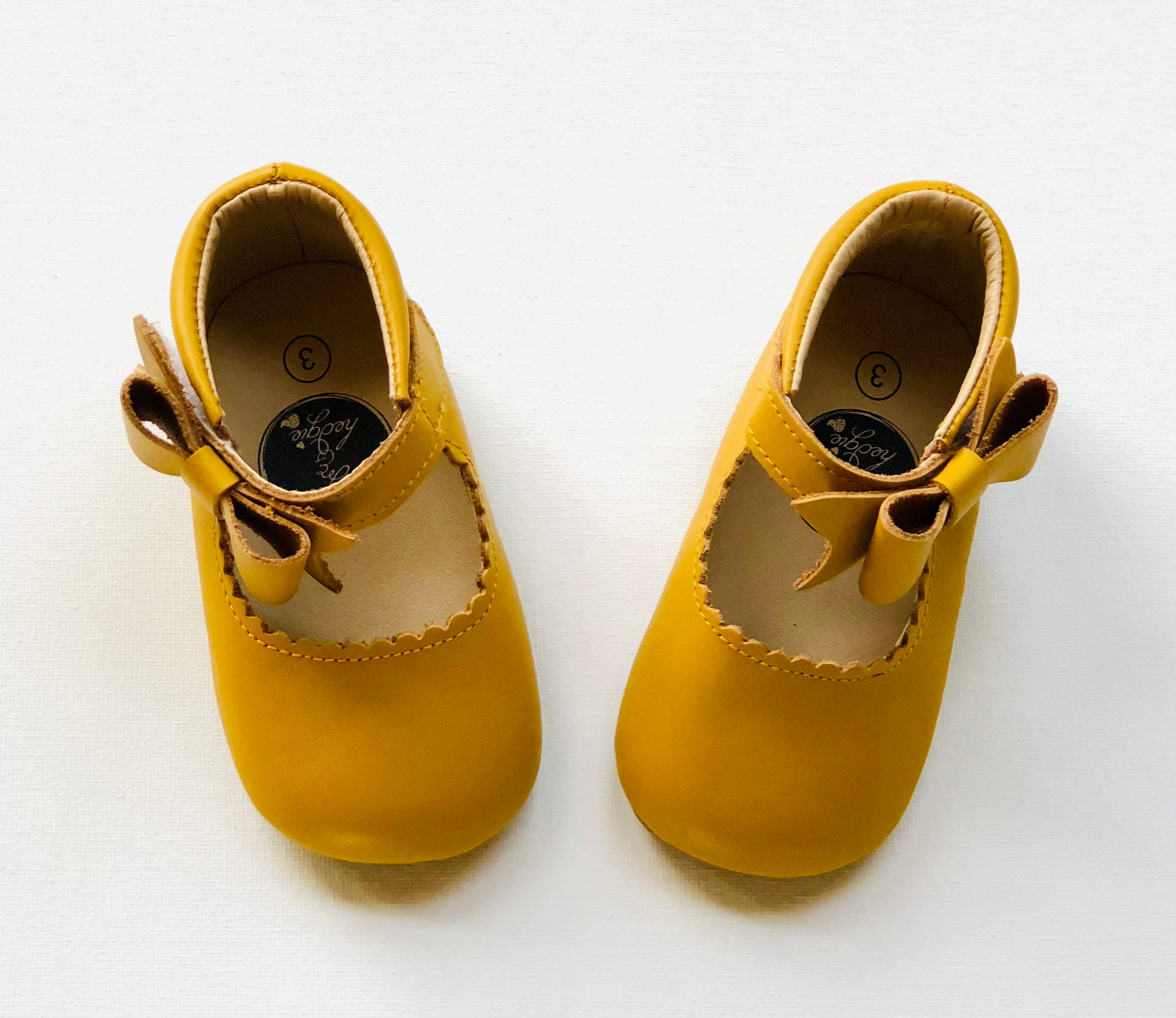 Sweet Mary Janes Marigold leather baby shoes with bow detail for first walkers