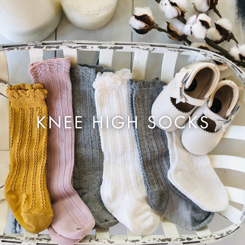 Collection of knee-high socks in various colors displayed on a white surface with 'Knee High Socks' text.