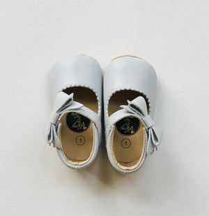 Sweet light gray leather baby Mary Jane shoes with soft soles, dainty front bows.
