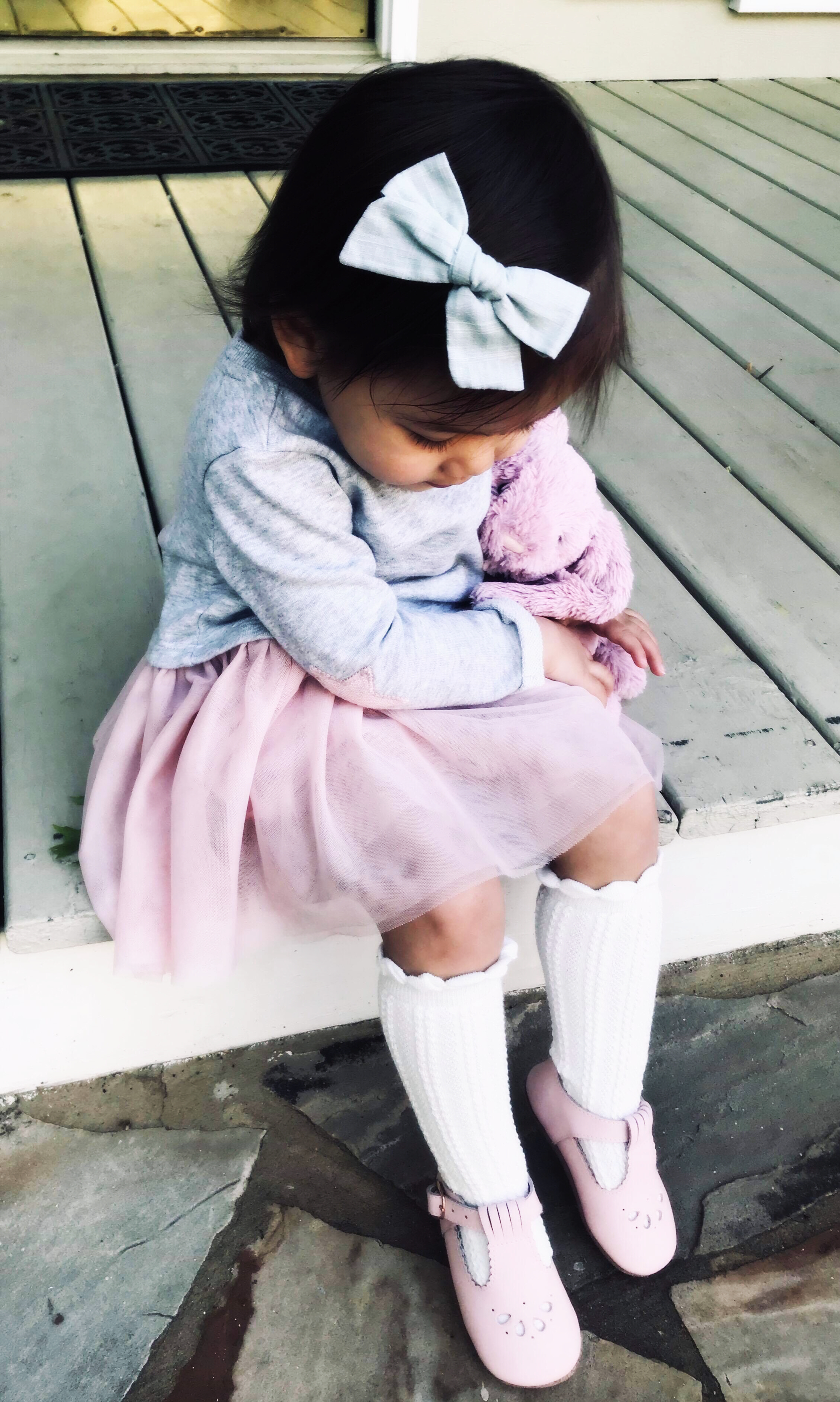 Toddler wearing Pink T-Bar shoes – comfortable and adorable for any occasion.