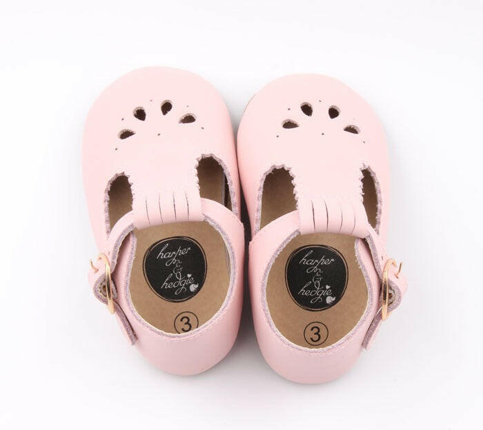 "Harper & Hedgie Pink T-Bar shoes – perfect for first steps and special moments.